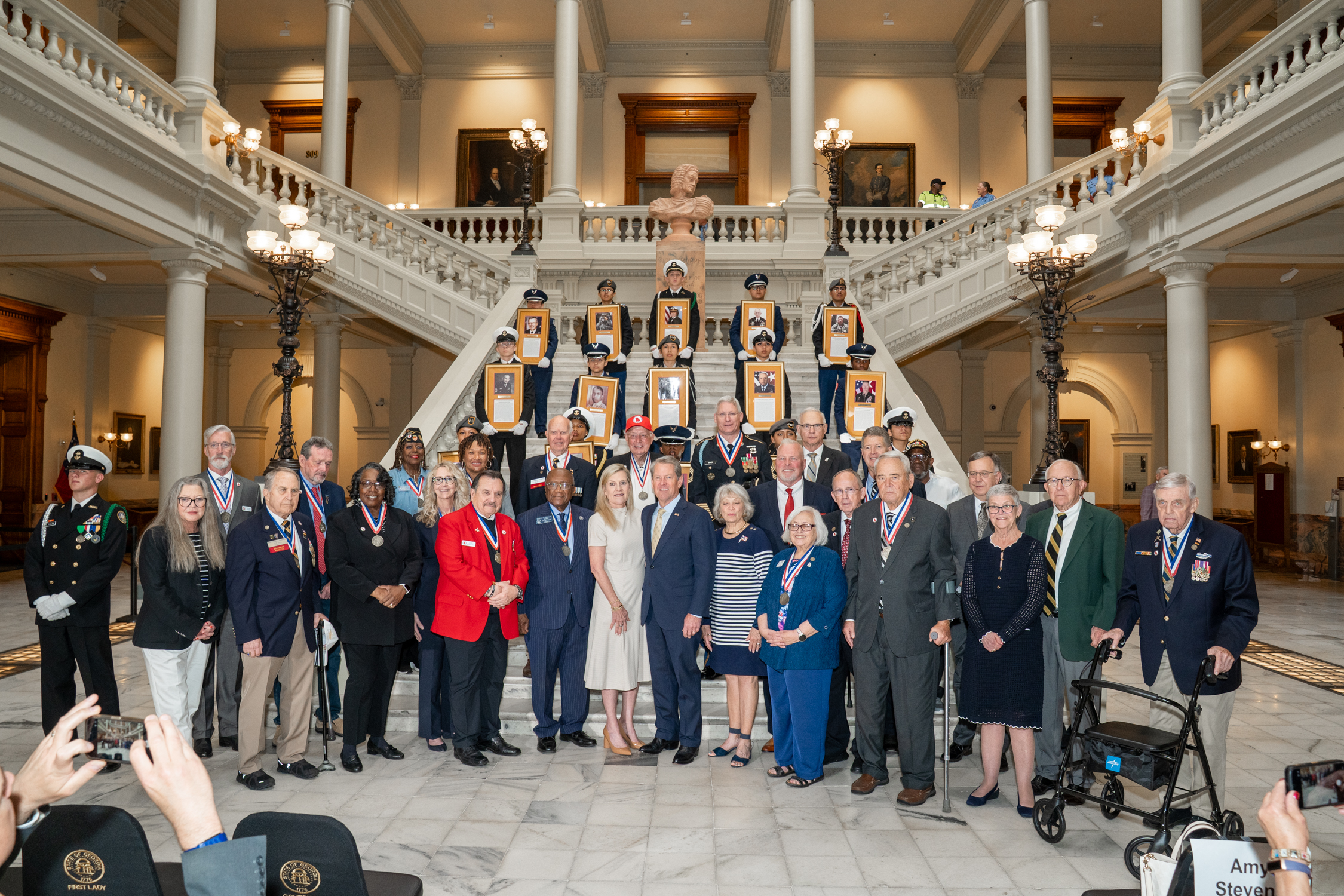 Full group with framed inductee portraits